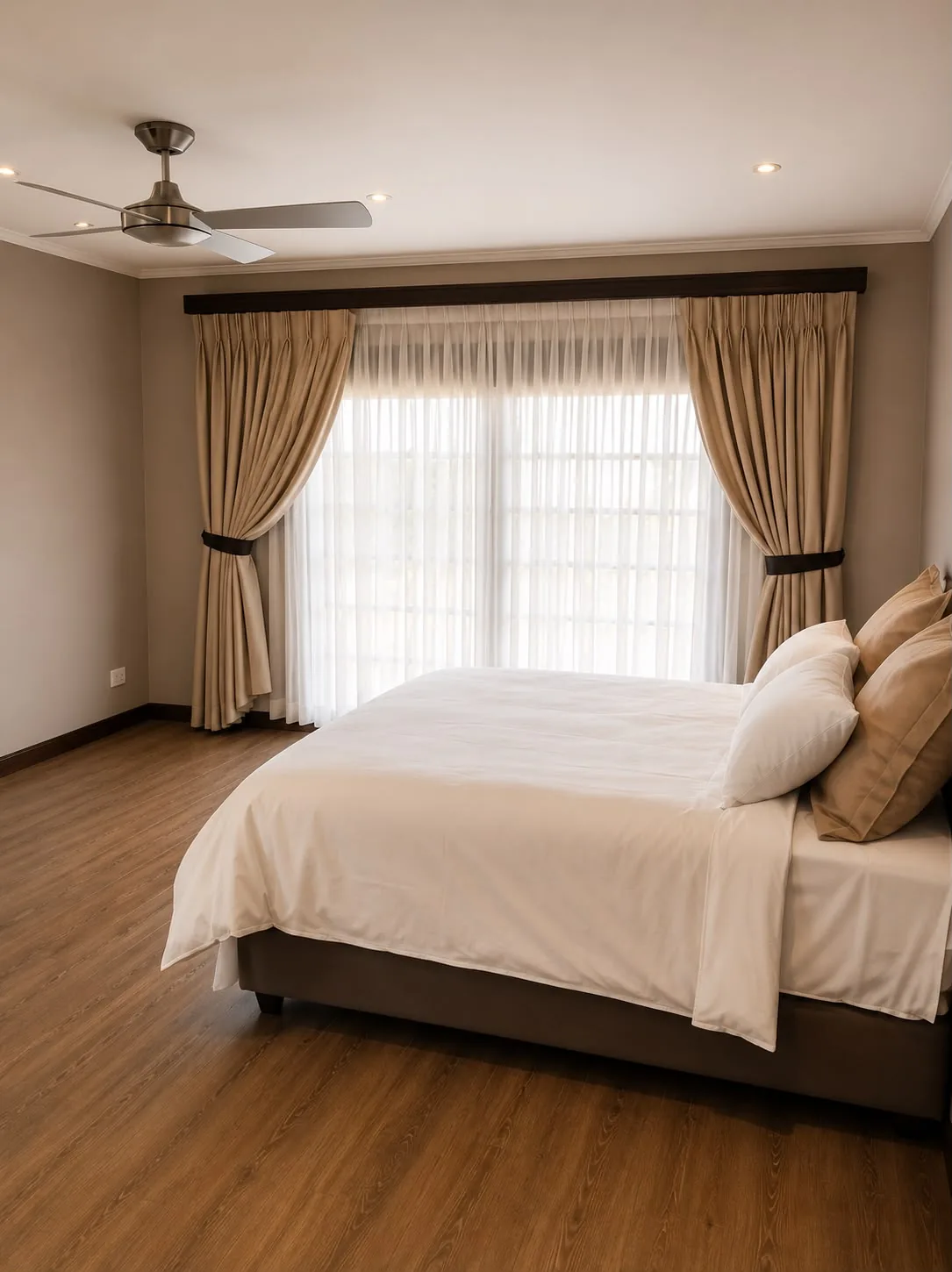 Comfortable guest bedroom with neutral finishes
